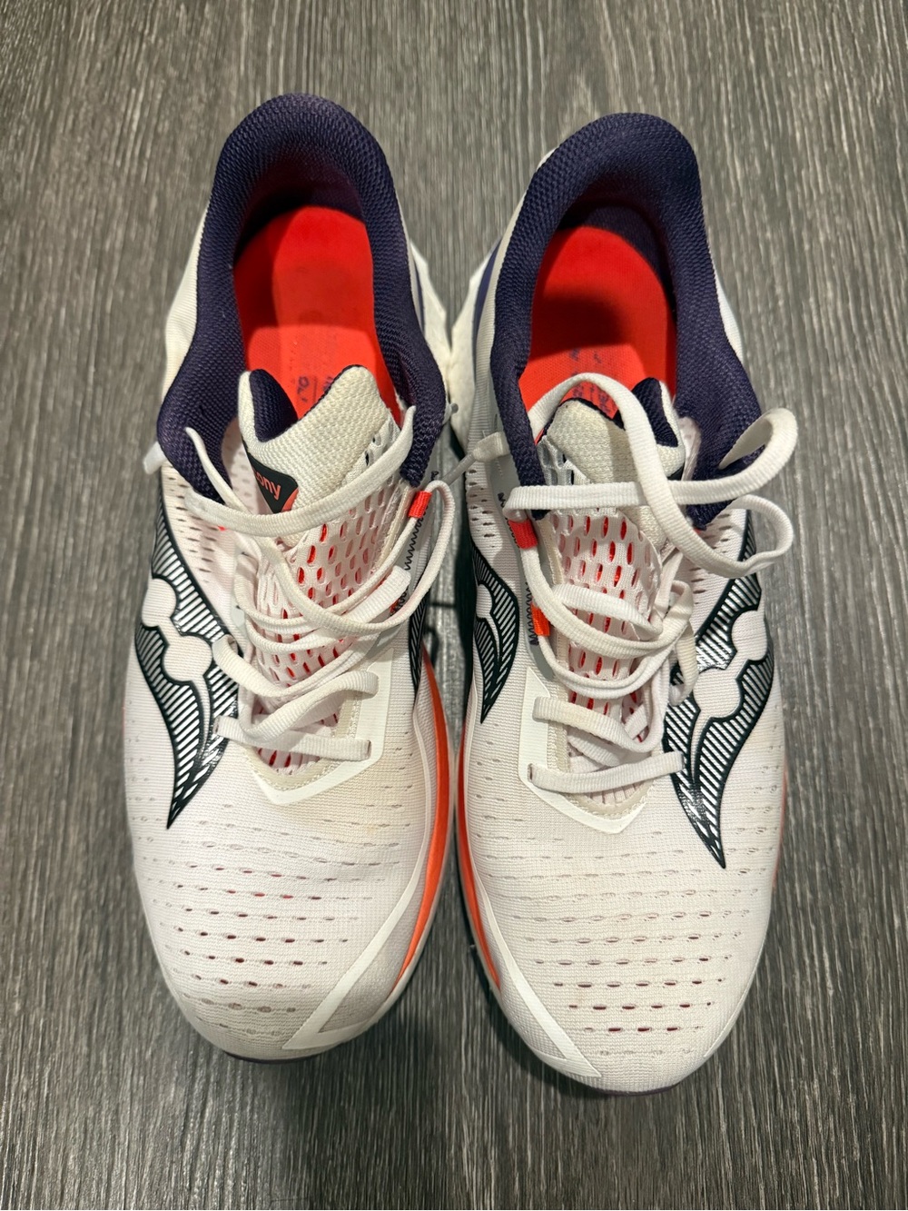 Saucony White Running Shoes with Navy and Red Accents